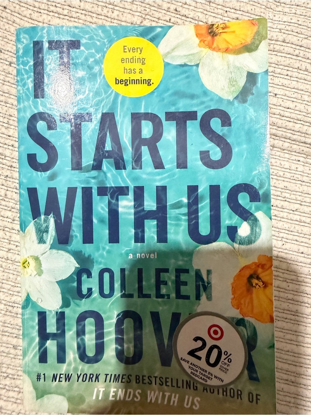 'It Starts With Us' Paperback Novel - Blue Cover